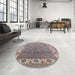 Round Mid-Century Modern Puce Purple Oriental Rug in a Office, urb1663