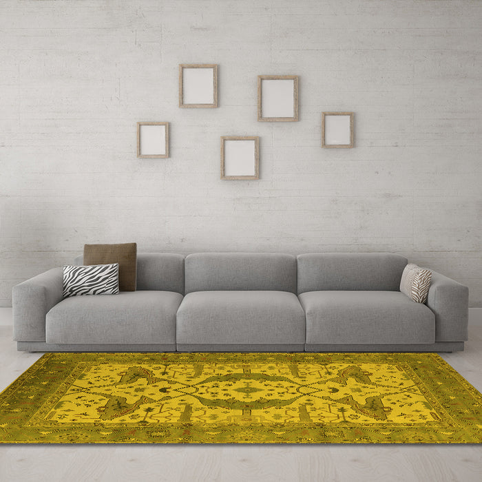 Machine Washable Oriental Yellow Industrial Rug in a Living Room, wshurb1676yw