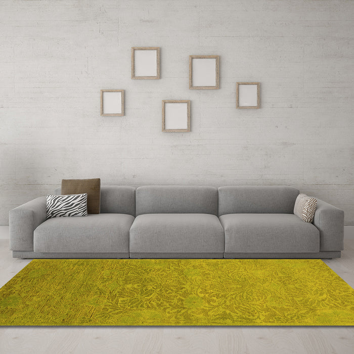Machine Washable Oriental Yellow Industrial Rug in a Living Room, wshurb1693yw