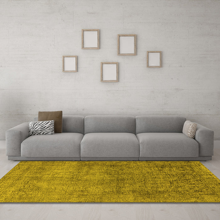 Machine Washable Oriental Yellow Industrial Rug in a Living Room, wshurb1734yw