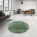 Round Mid-Century Modern Dark Olive Green Oriental Rug in a Office, urb1961