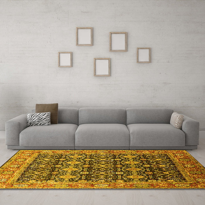 Machine Washable Oriental Yellow Traditional Rug in a Living Room, wshurb2035yw