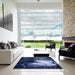 Square Mid-Century Modern Blue Oriental Rug in a Living Room, urb2057