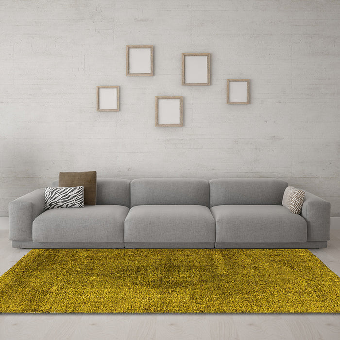Machine Washable Oriental Yellow Industrial Rug in a Living Room, wshurb2216yw