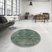 Round Mid-Century Modern Green Oriental Rug in a Office, urb2240