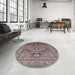 Round Mid-Century Modern Rosy Brown Pink Oriental Rug in a Office, urb2325