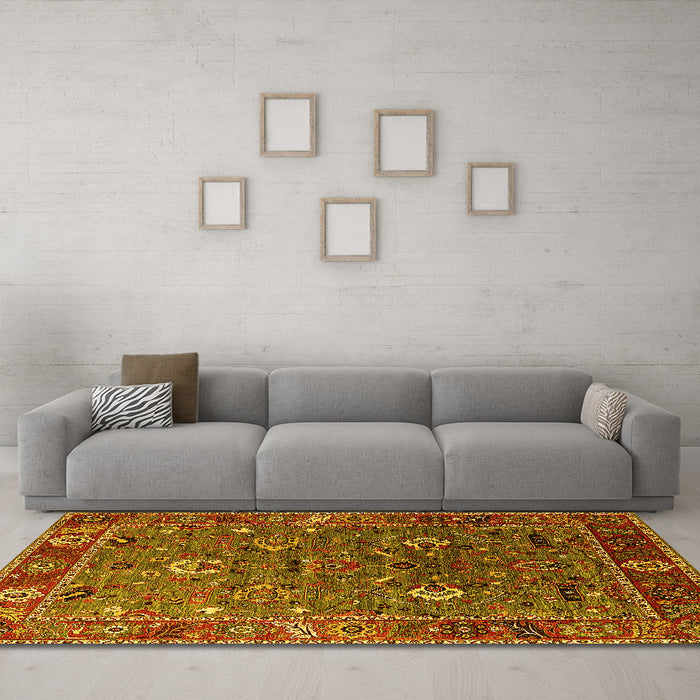 Machine Washable Oriental Yellow Traditional Rug in a Living Room, wshurb2415yw