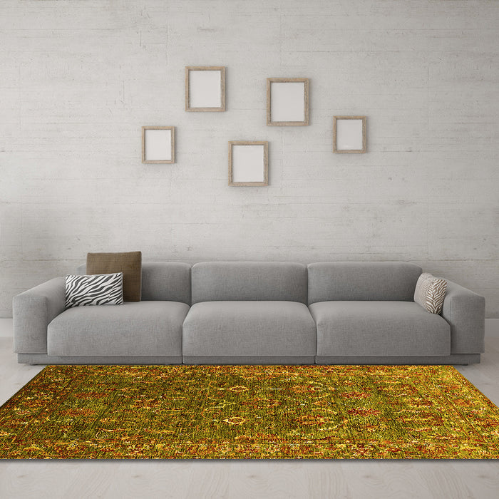 Machine Washable Oriental Yellow Traditional Rug in a Living Room, wshurb2420yw