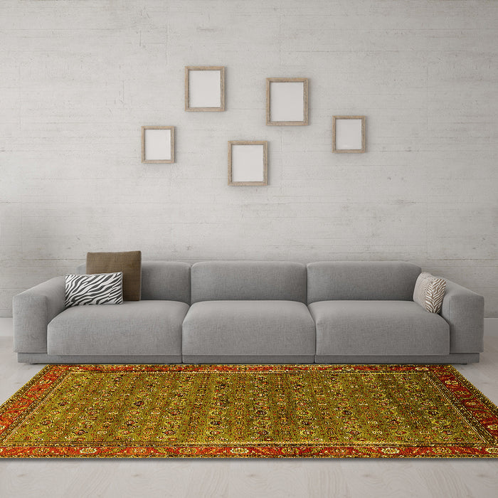 Machine Washable Oriental Yellow Traditional Rug in a Living Room, wshurb2422yw