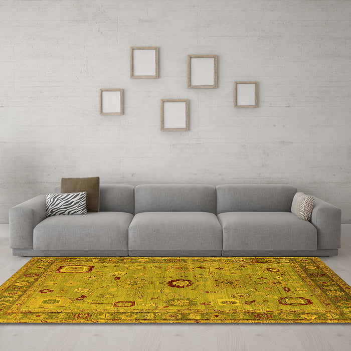 Machine Washable Oriental Yellow Industrial Rug in a Living Room, wshurb2439yw