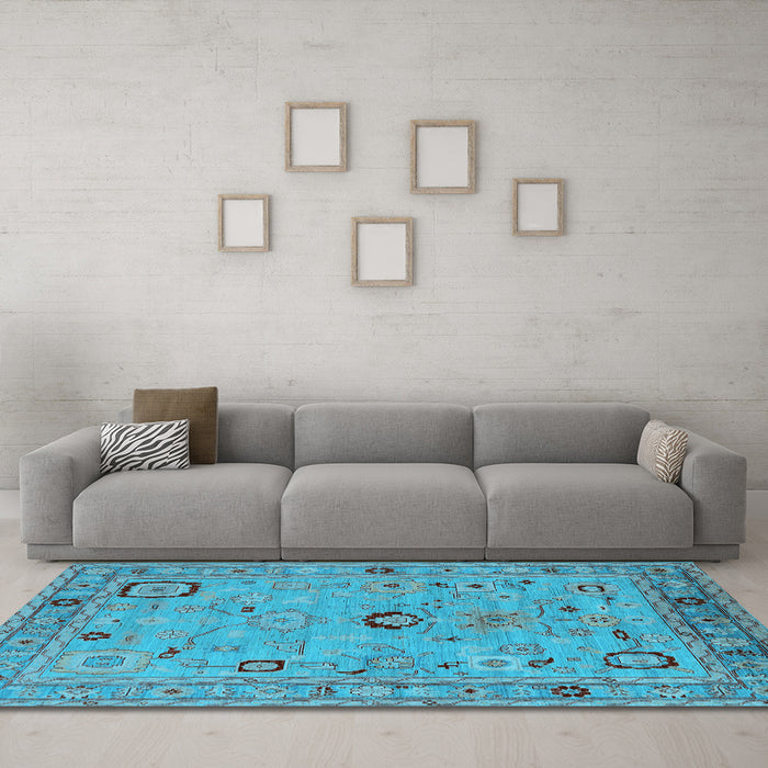 Machine Washable Oriental Light Blue Traditional Rug in a Living Room, wshurb2440lblu