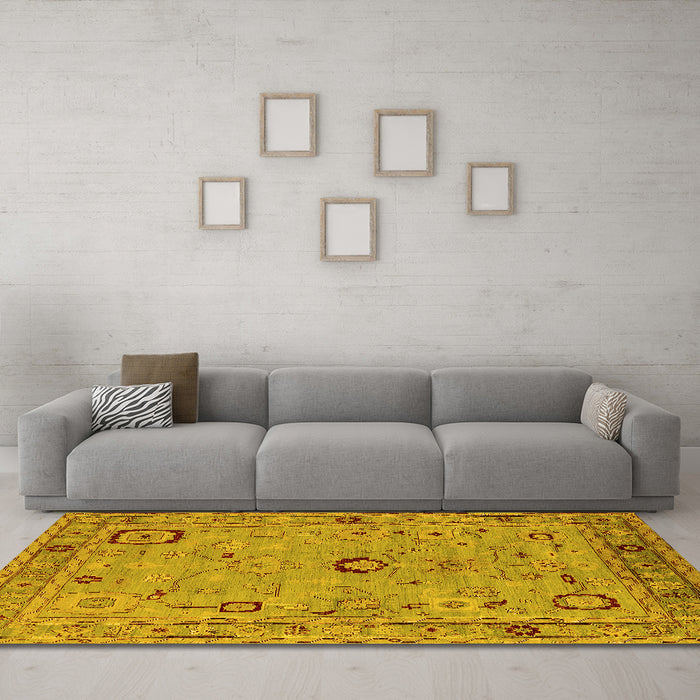 Machine Washable Oriental Yellow Traditional Rug in a Living Room, wshurb2440yw