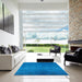 Square Mid-Century Modern Deep Sky Blue Oriental Rug in a Living Room, urb2449