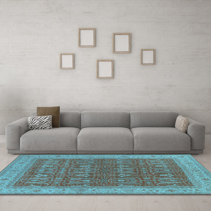 Machine Washable Oriental Light Blue Industrial Rug in a Living Room, wshurb2454lblu