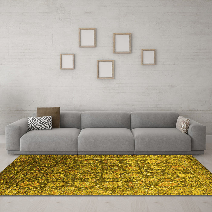 Machine Washable Oriental Yellow Industrial Rug in a Living Room, wshurb2470yw