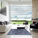 Square Mid-Century Modern Blue Oriental Rug in a Living Room, urb2565