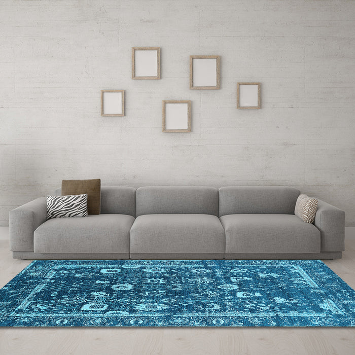 Machine Washable Oriental Light Blue Industrial Rug in a Living Room, wshurb2565lblu