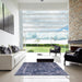 Square Mid-Century Modern Blue Oriental Rug in a Living Room, urb2571