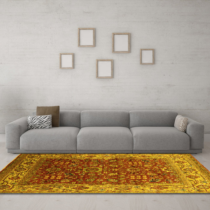 Machine Washable Oriental Yellow Traditional Rug in a Living Room, wshurb2630yw