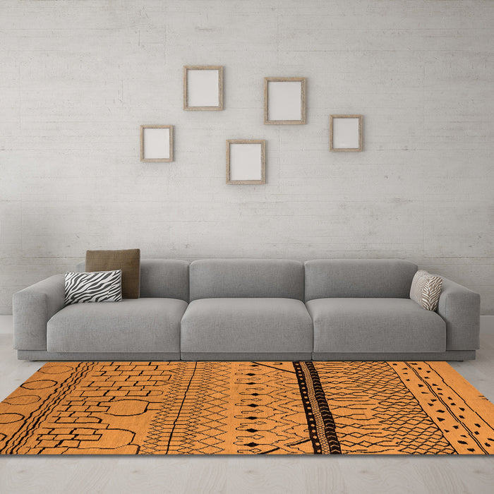Machine Washable Solid Orange Modern Area Rugs in a Living Room, wshurb2701org