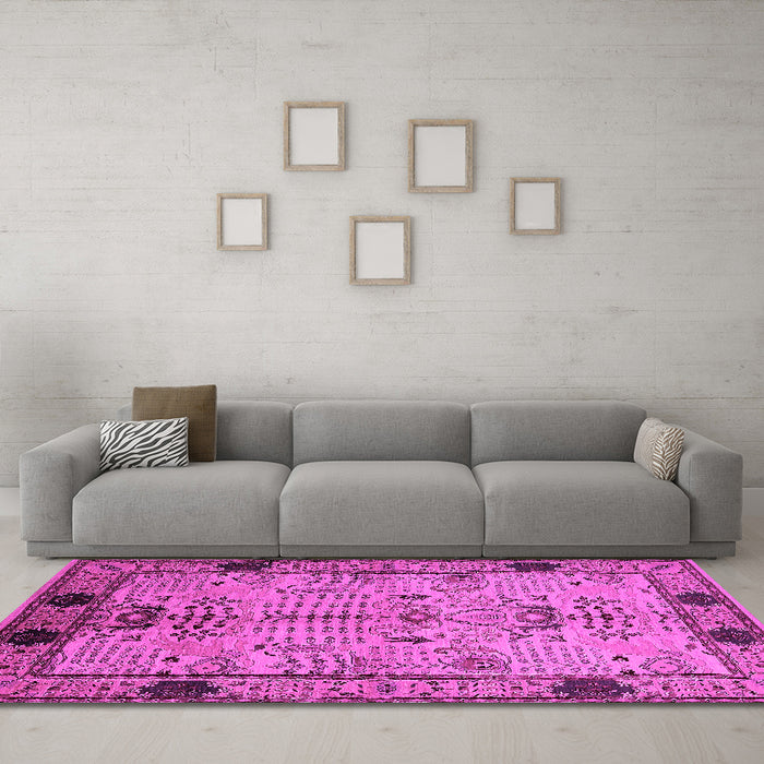 Machine Washable Oriental Pink Traditional Rug in a Living Room, wshurb2852pnk