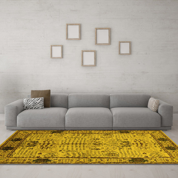 Machine Washable Oriental Yellow Traditional Rug in a Living Room, wshurb2852yw