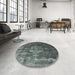 Round Mid-Century Modern Gunmetal Gray Oriental Rug in a Office, urb2894