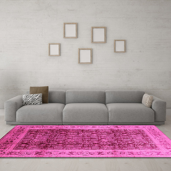 Machine Washable Oriental Pink Traditional Rug in a Living Room, wshurb2918pnk