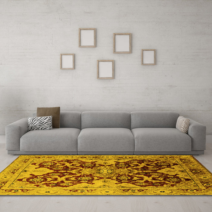 Machine Washable Oriental Yellow Traditional Rug in a Living Room, wshurb2941yw