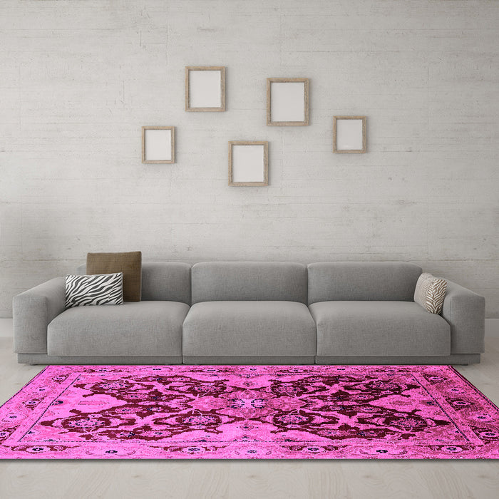 Machine Washable Oriental Pink Traditional Rug in a Living Room, wshurb2941pnk