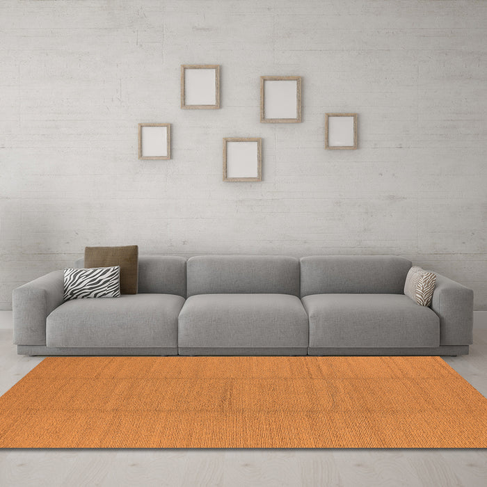 Machine Washable Solid Orange Modern Area Rugs in a Living Room, wshurb2948org