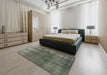 Mid-Century Modern Dark Olive Green Oriental Rug in a Bedroom, urb2987