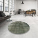 Round Mid-Century Modern Dark Olive Green Oriental Rug in a Office, urb2987