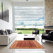 Square Mid-Century Modern Orange Oriental Rug in a Living Room, urb2994