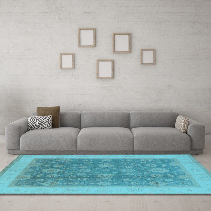 Machine Washable Oriental Light Blue Industrial Rug in a Living Room, wshurb3085lblu