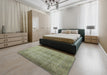 Mid-Century Modern Olive Green Oriental Rug in a Bedroom, urb3109