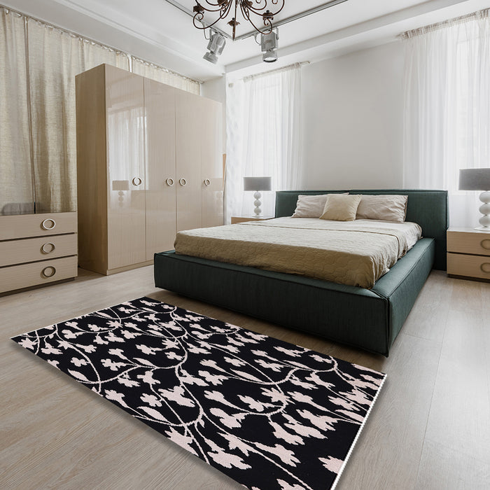 Mid-Century Modern Black Oriental Rug in a Bedroom, urb451