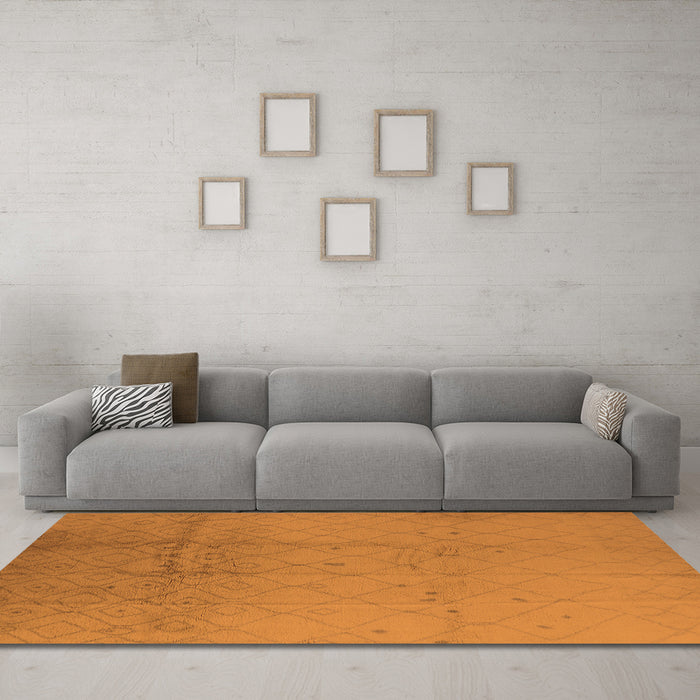Machine Washable Solid Orange Modern Area Rugs in a Living Room, wshurb488org