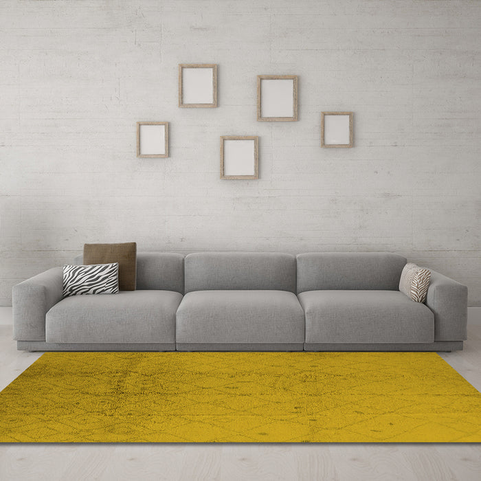 Machine Washable Solid Yellow Modern Rug in a Living Room, wshurb488yw