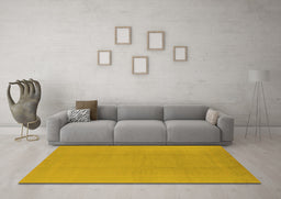 Machine Washable Solid Yellow Modern Rug in a Living Room, wshurb502yw