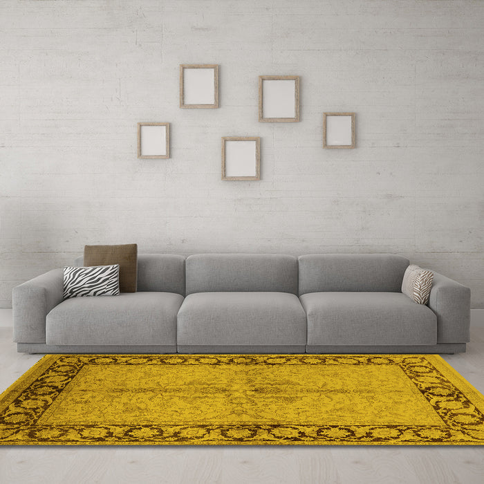 Machine Washable Oriental Yellow Traditional Rug in a Living Room, wshurb519yw