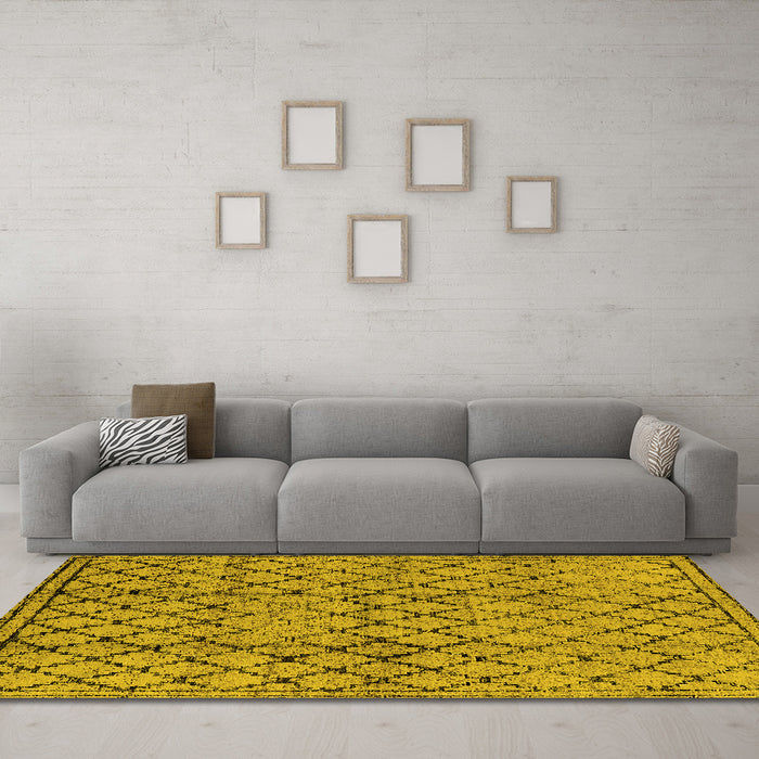 Machine Washable Solid Yellow Modern Rug in a Living Room, wshurb529yw