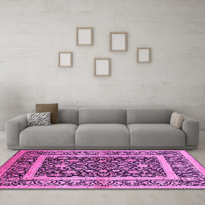 Machine Washable Oriental Pink Traditional Rug in a Living Room, wshurb530pnk