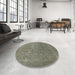 Round Mid-Century Modern Dark Green Oriental Rug in a Office, urb554