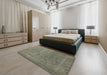 Mid-Century Modern Dark Green Oriental Rug in a Bedroom, urb554