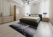 Mid-Century Modern Charcoal Black Oriental Rug in a Bedroom, urb564