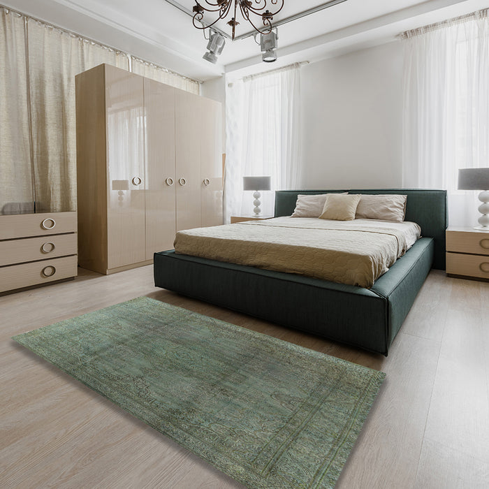 Mid-Century Modern Dark Olive Green Oriental Rug in a Bedroom, urb566