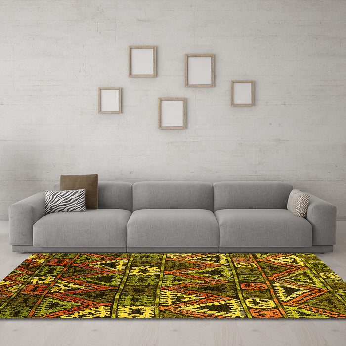 Machine Washable Oriental Yellow Industrial Rug in a Living Room, wshurb576yw