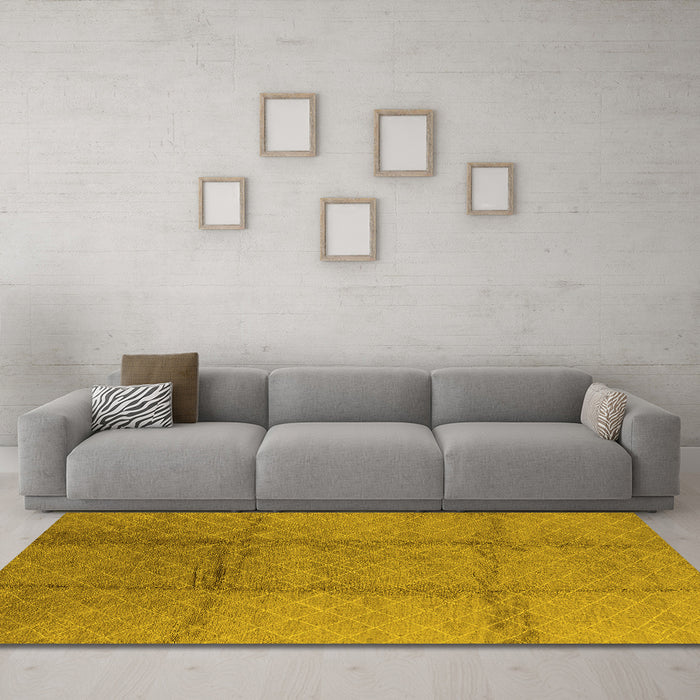 Machine Washable Solid Yellow Modern Rug in a Living Room, wshurb598yw