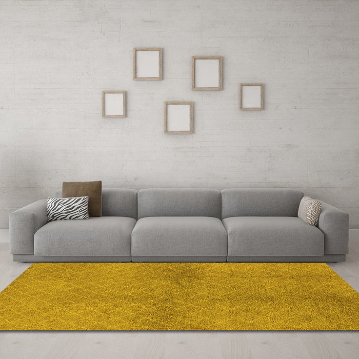 Machine Washable Solid Yellow Modern Rug in a Living Room, wshurb600yw